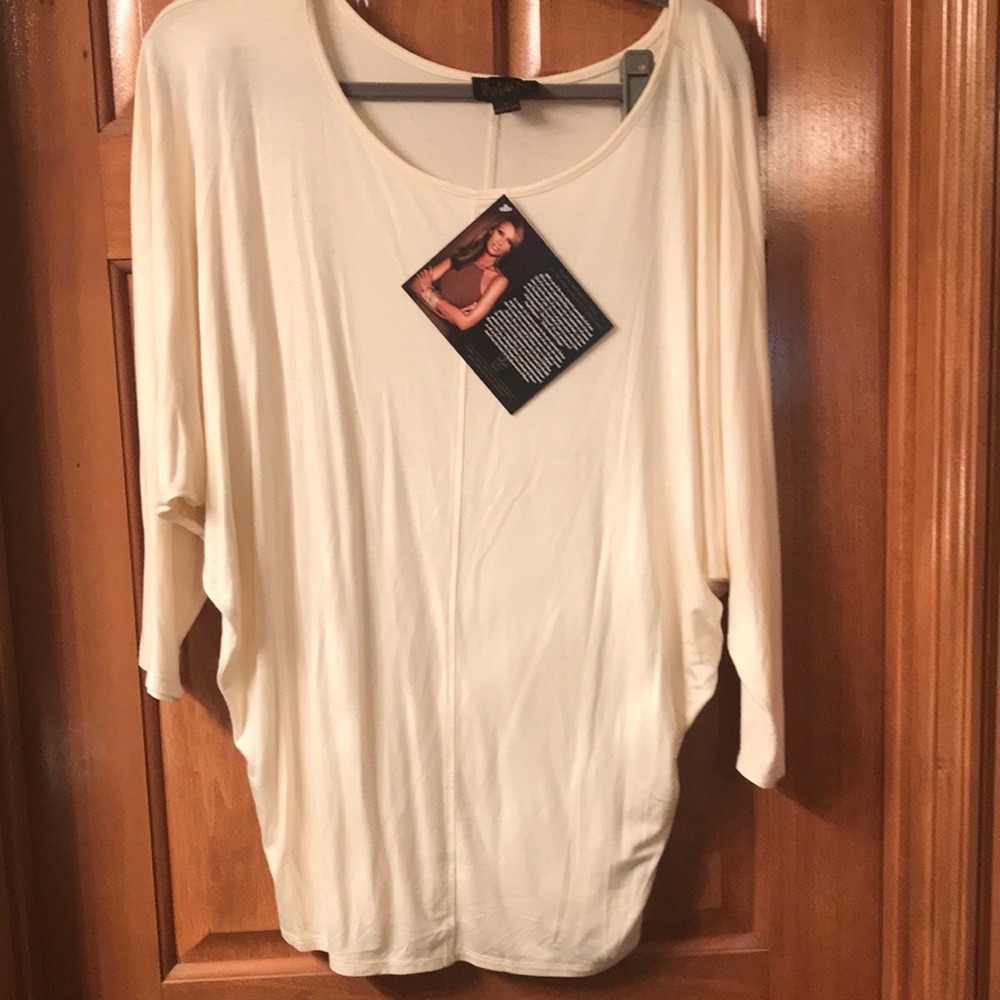 Brand new with tags IMAN tunic.
